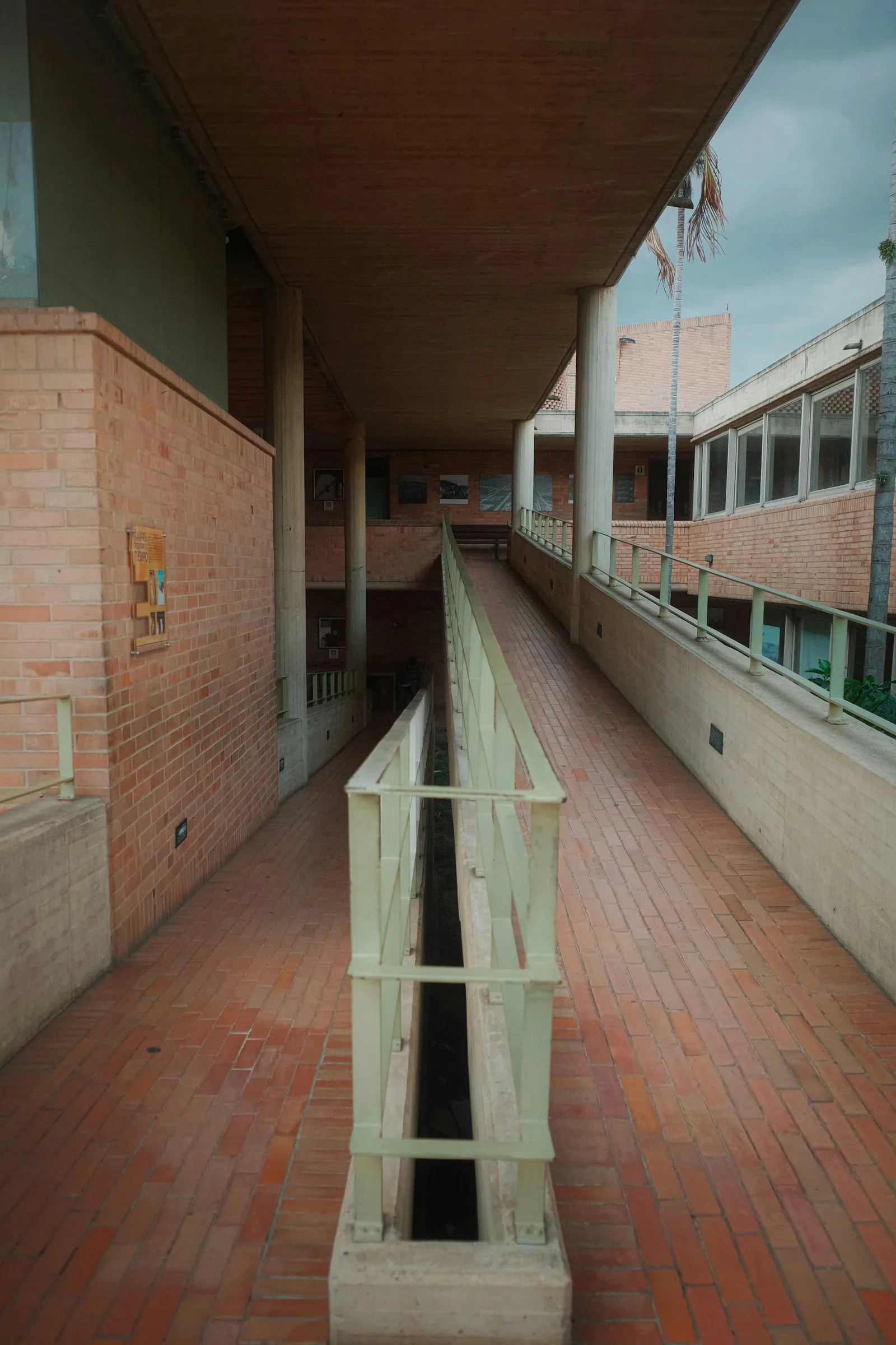 A ramp leading into a brick building.