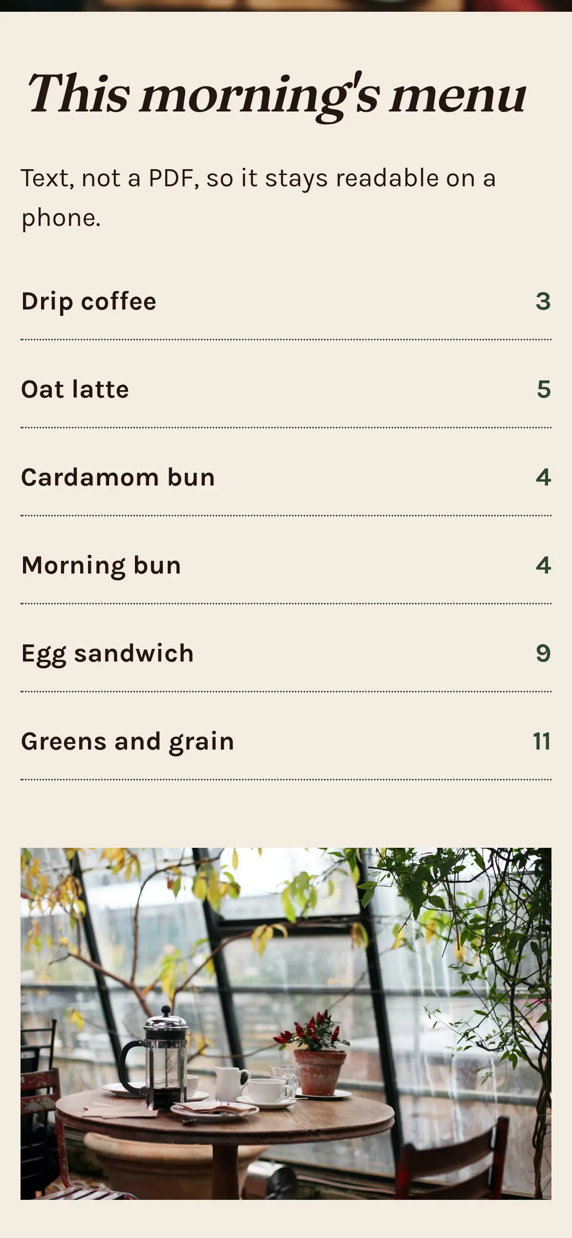 Phone screenshot of the Fennwick menu, listing drip coffee, an oat latte, a cardamom bun, and other items as text with prices.